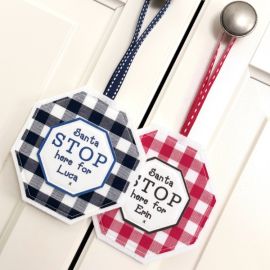 Personalised Santa Stop Here sign in navy and red gingham